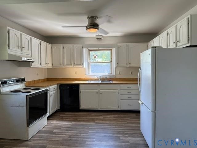 2109 Parkside Avenue, Lakeside, Henrico, VA 23228 White cabinetry, wood-finish countertops, wood-finish flooring, white appliances, and a ceiling fan with integrated lighting