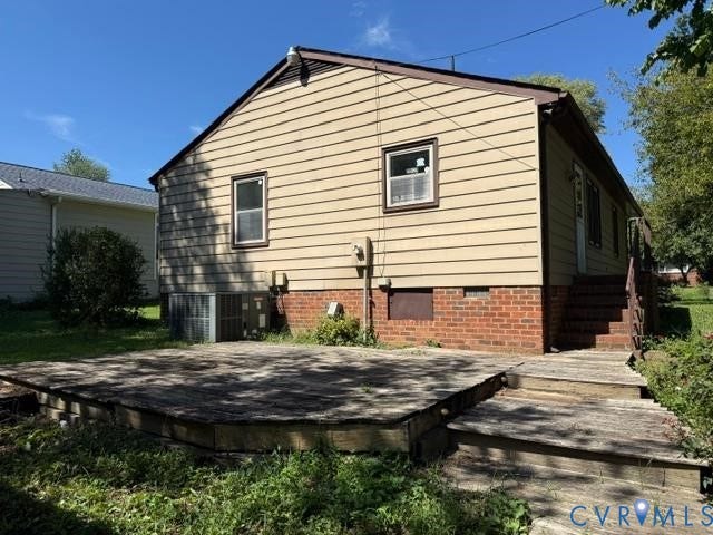 2109 Parkside Avenue, Lakeside, Henrico, VA 23228 Exterior siding in a neutral tone, brick foundation, and an outdoor deck space