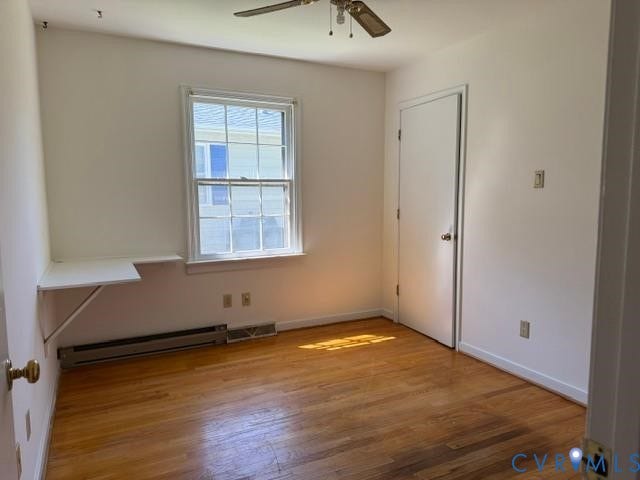 2109 Parkside Avenue, Lakeside, Henrico, VA 23228 Hardwood-finish flooring, built-in shelving, white trim, and a ceiling fan