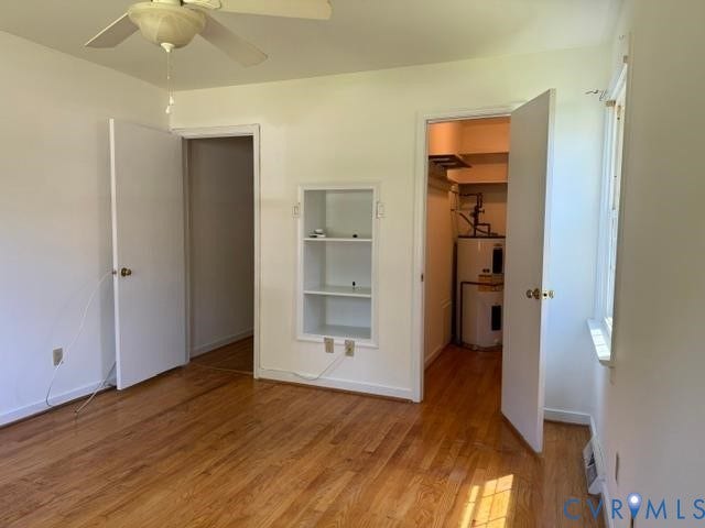 2109 Parkside Avenue, Lakeside, Henrico, VA 23228 Hardwood flooring, ceiling fan, built-in shelving, white paneled doors, and a window