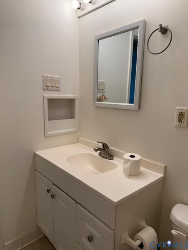2109 Parkside Avenue, Lakeside, Henrico, VA 23228 White vanity with integrated sink, chrome faucet, and storage cabinetry