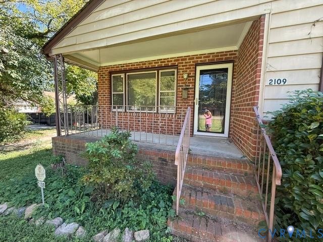 2109 Parkside Avenue, Lakeside, Henrico, VA 23228 Brick exterior with siding accents, covered front porch, and brick steps