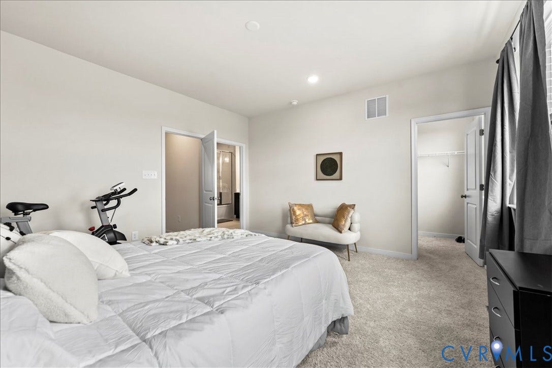 412 Quiet Breeze Alley, Chesterfield, VA 23113 Plush carpeting throughout, neutral wall paint, recessed lighting, white trim, and a walk-in closet