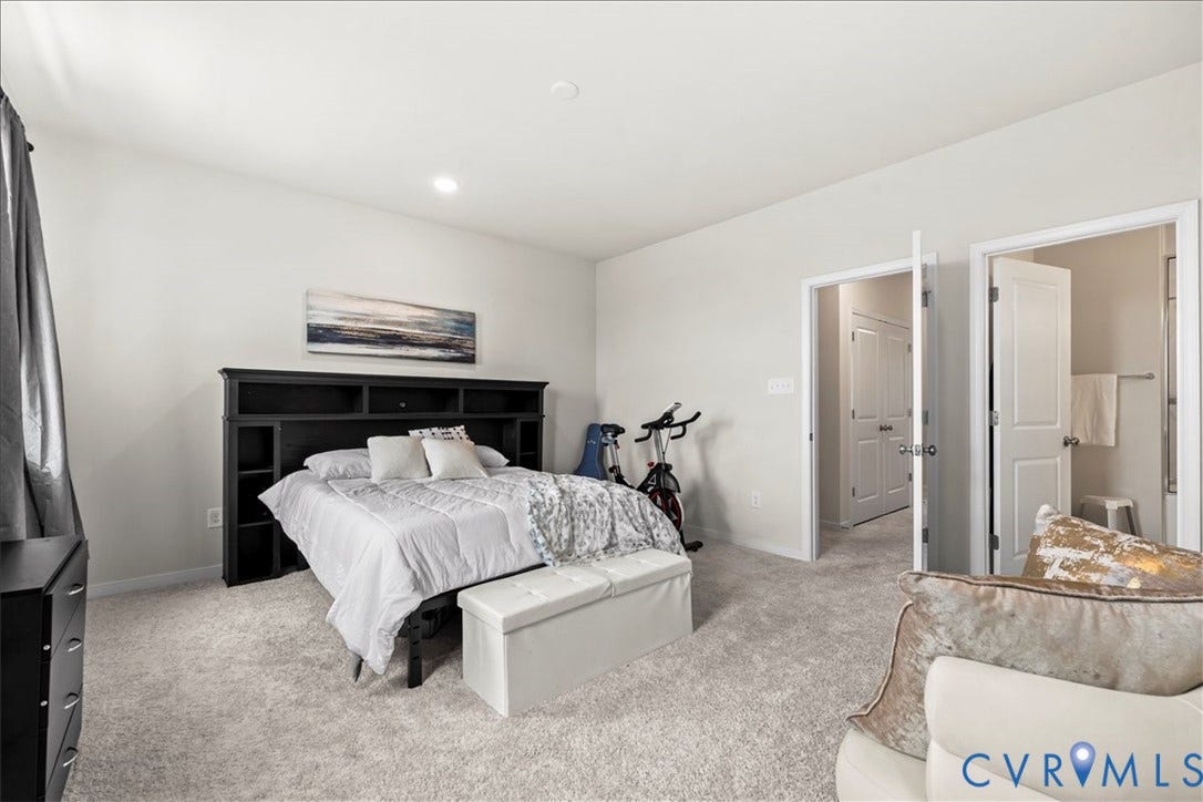 412 Quiet Breeze Alley, Chesterfield, VA 23113 Carpeted bedroom featuring recessed lighting and a built-in headboard storage unit