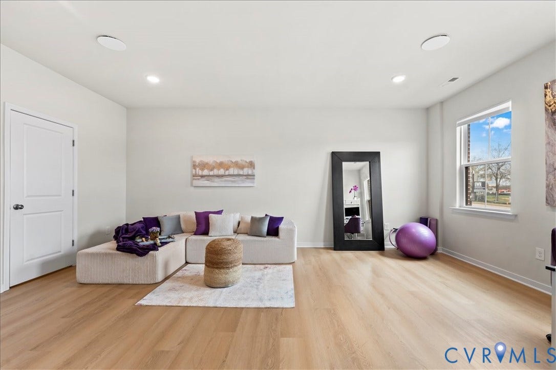 412 Quiet Breeze Alley, Chesterfield, VA 23113 Recessed ceiling lighting, wood-finish flooring, white two-panel door, and a prominent window
