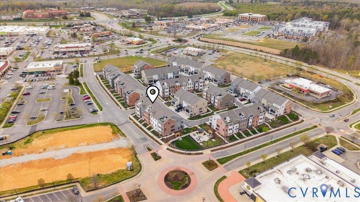 412 Quiet Breeze Alley, Chesterfield, VA 23113 Aerial perspective of a townhome community featuring brick and siding exteriors