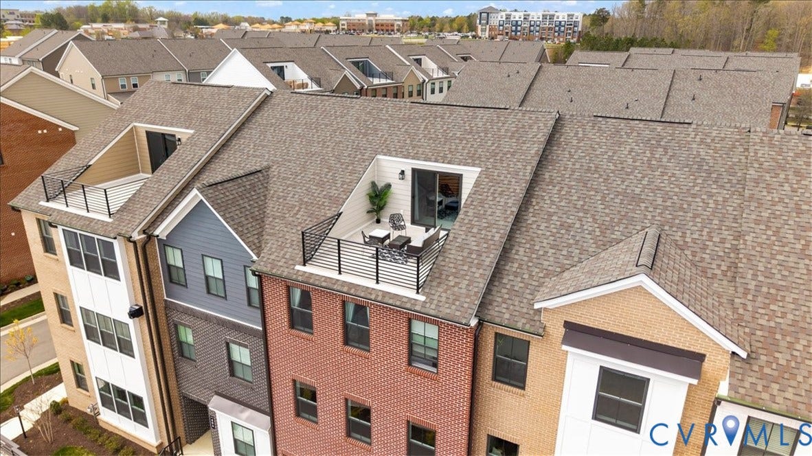 412 Quiet Breeze Alley, Chesterfield, VA 23113 Multi-story townhome featuring a rooftop terrace with a black metal railing