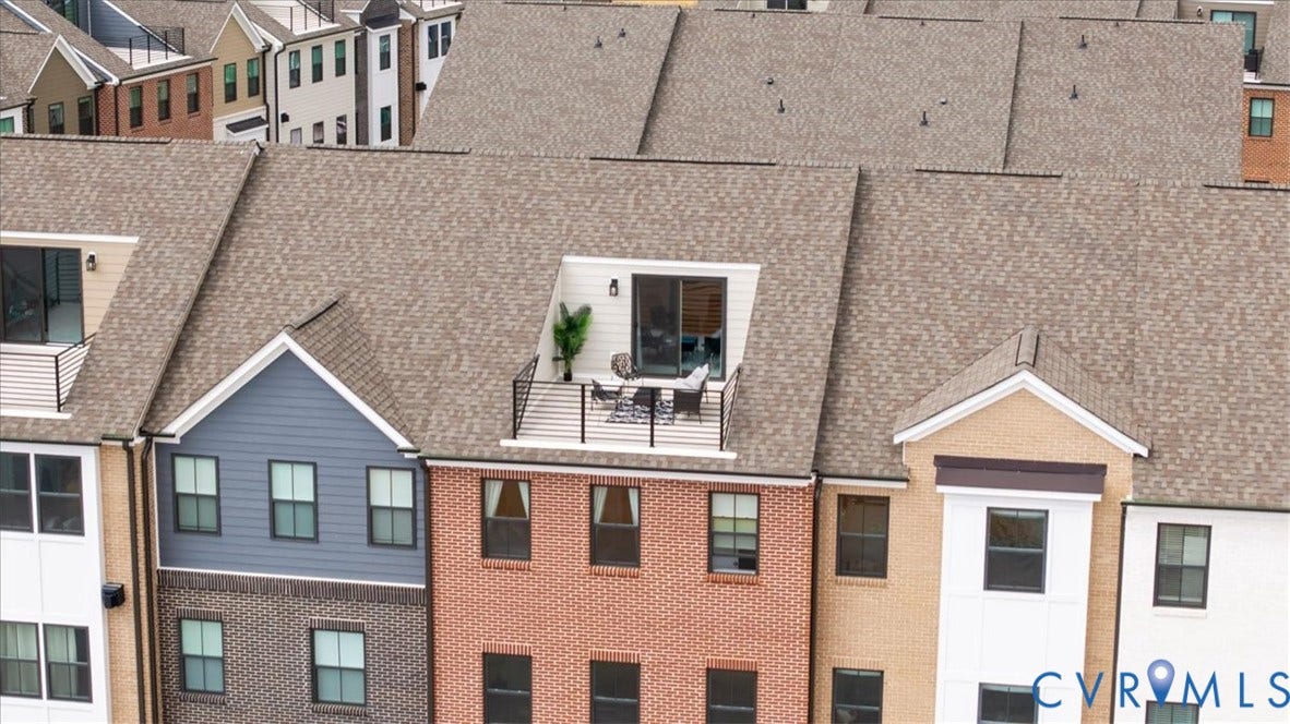 412 Quiet Breeze Alley, Chesterfield, VA 23113 Rooftop terrace with black metal railings and sliding glass door access