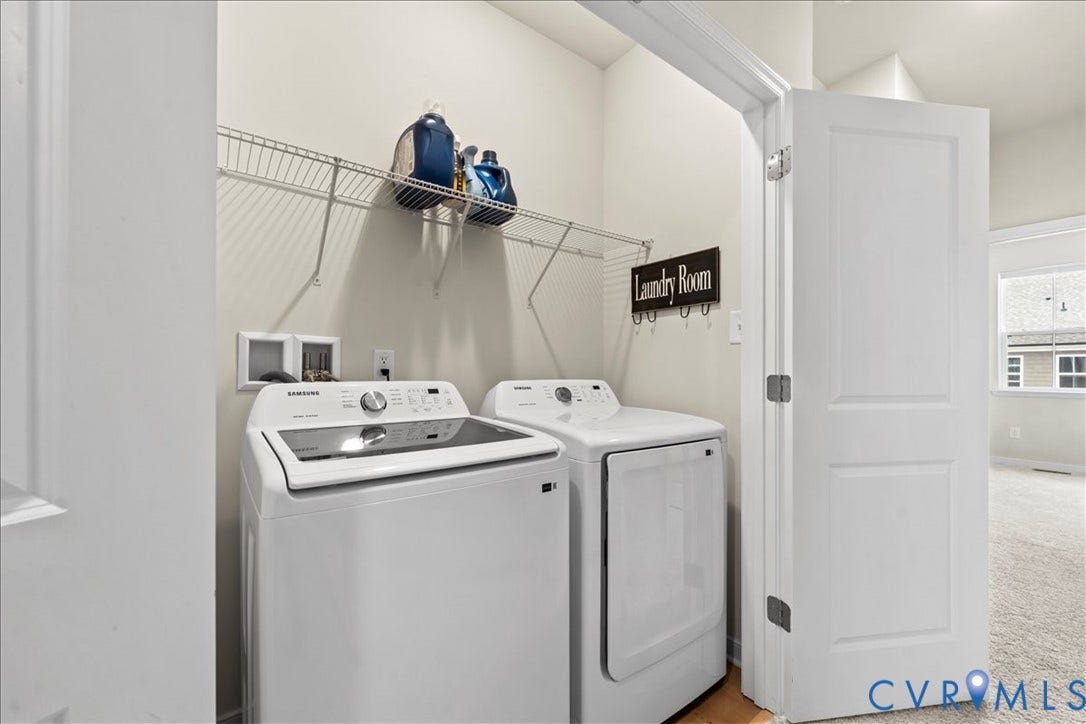 412 Quiet Breeze Alley, Chesterfield, VA 23113 Dedicated laundry area featuring wire shelving and wood-finish flooring