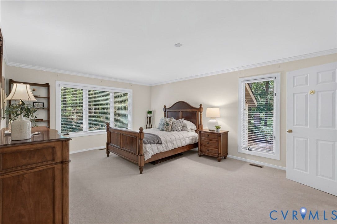 13001 River Hills Drive, Midlothian, VA 23113 Spacious first floor primary bedroom with walk-in closet and ensuite bath.