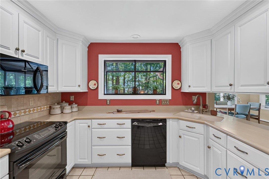 13001 River Hills Drive, Midlothian, VA 23113 Bright, kitchen with abundant cabinetry and generous counter space featuring a nice garden window to bring in more of the natural surroundings.