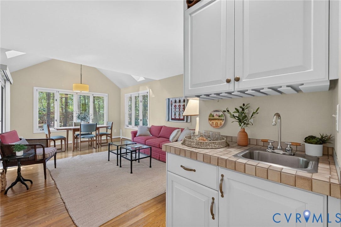 13001 River Hills Drive, Midlothian, VA 23113 Designed for easy entertaining, the wet bar opens to the family room and casual dining area.