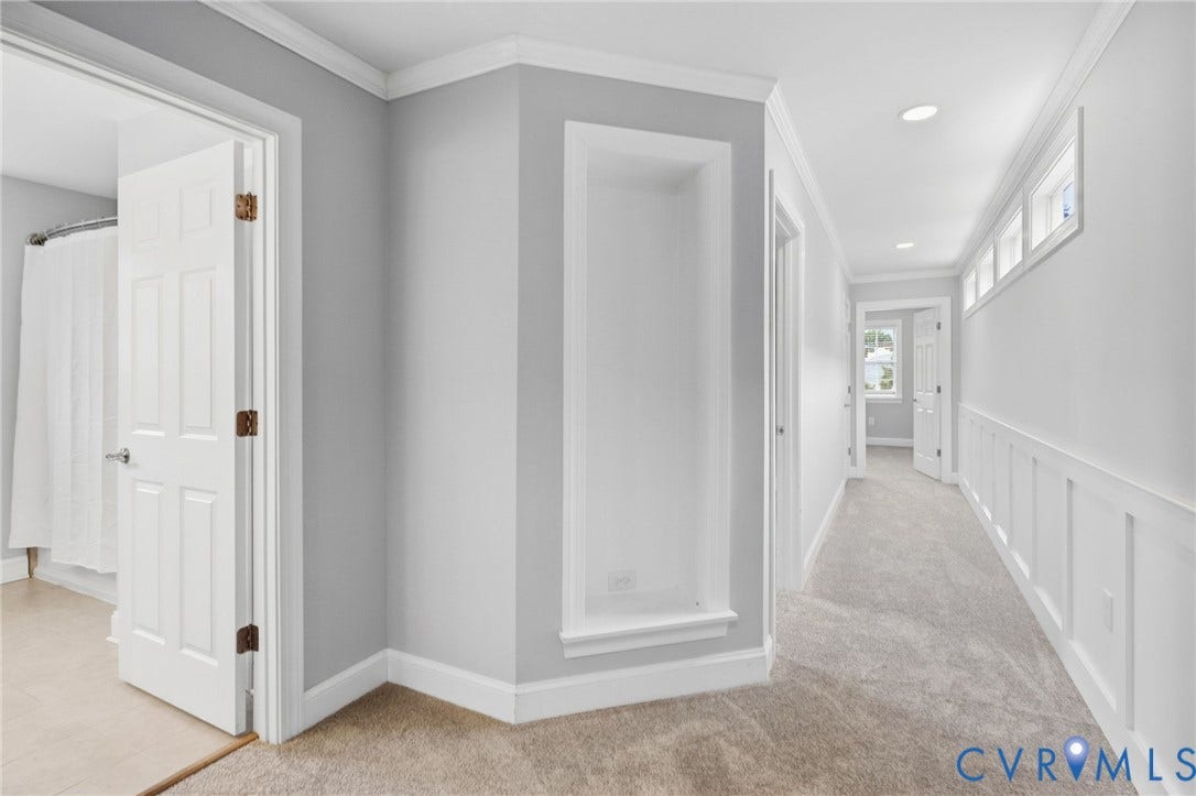 2002 Fairmount Avenue, Church Hill, Richmond, VA 23223 Hallway featuring recessed lighting, a built-in display niche, paneled wainscoting, and carpet flooring