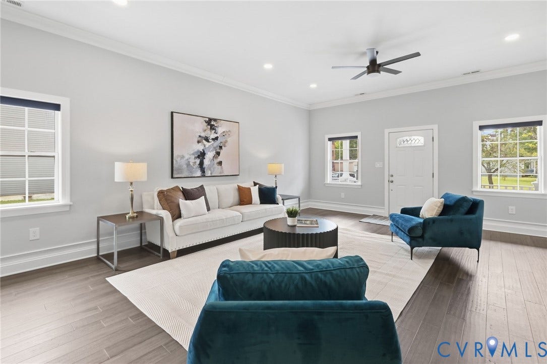 2002 Fairmount Avenue, Church Hill, Richmond, VA 23223 Spacious living area featuring wood-finish flooring, recessed lighting, and crown molding