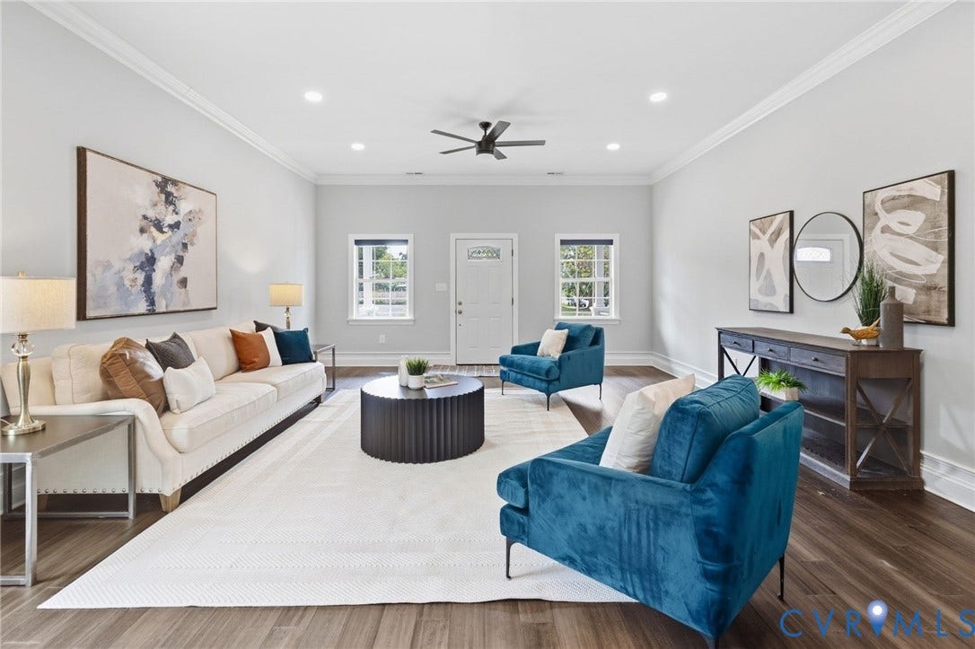2002 Fairmount Avenue, Church Hill, Richmond, VA 23223 Spacious living area featuring wood-finish flooring, recessed lighting, crown molding, and a ceiling fan