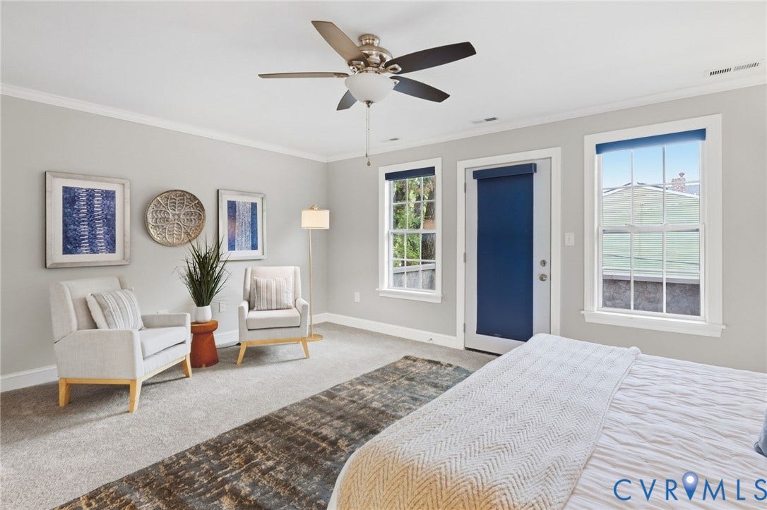 2002 Fairmount Avenue, Church Hill, Richmond, VA 23223 Ceiling fan with integrated lighting, wall-to-wall carpeting, crown molding, double-hung windows, and a built-in door