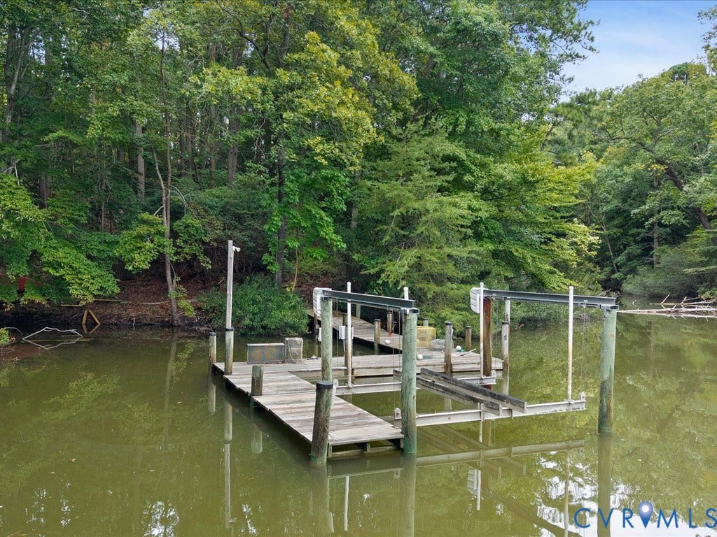 147 Oyster Cove Landing, Hartfield, VA 23071 Private dock with boat lift and wooded shoreline