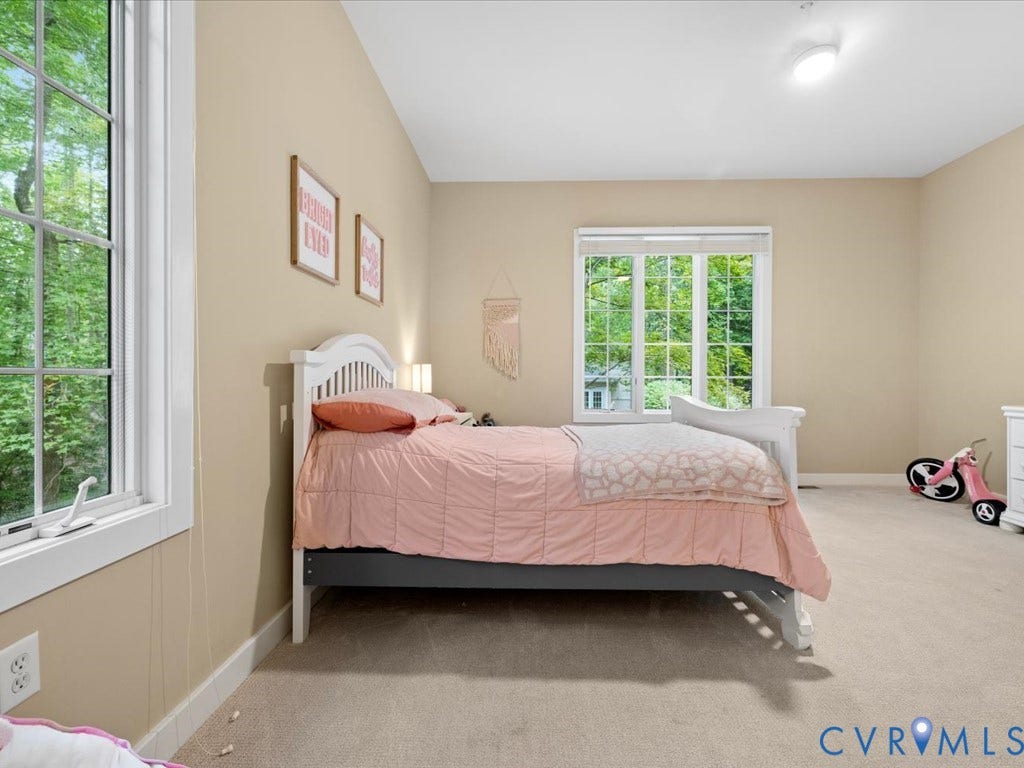 147 Oyster Cove Landing, Hartfield, VA 23071 Recessed lighting, large multi-pane windows, neutral wall tones, and light-toned carpeting
