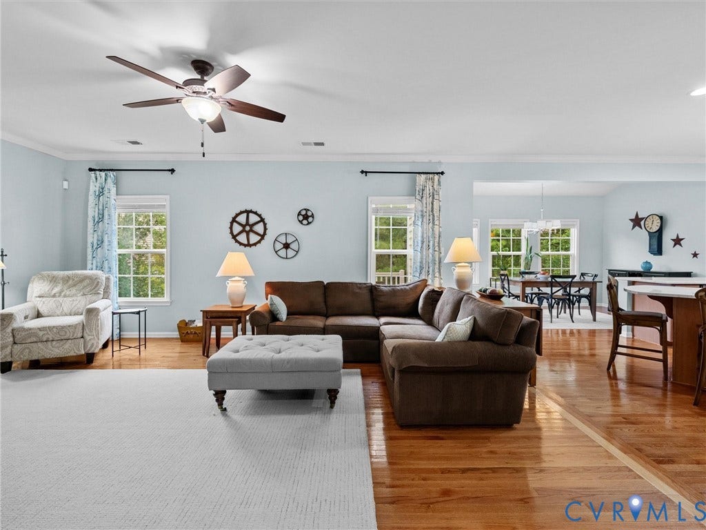 9990 Orchard Meadow Road, Mechanicsville, VA 23116 Hardwood flooring, recessed lighting, and a ceiling fan with integrated lighting