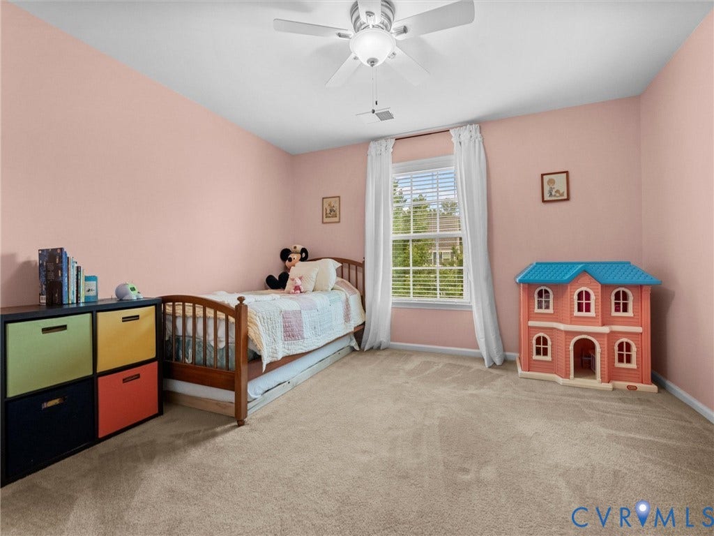 9990 Orchard Meadow Road, Mechanicsville, VA 23116 Carpeted room featuring a ceiling fan with integrated lighting, a window with blinds, and white baseboards