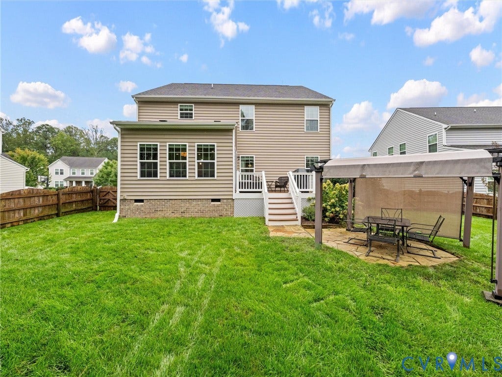 9990 Orchard Meadow Road, Mechanicsville, VA 23116 Expansive rear yard with a wooden privacy fence