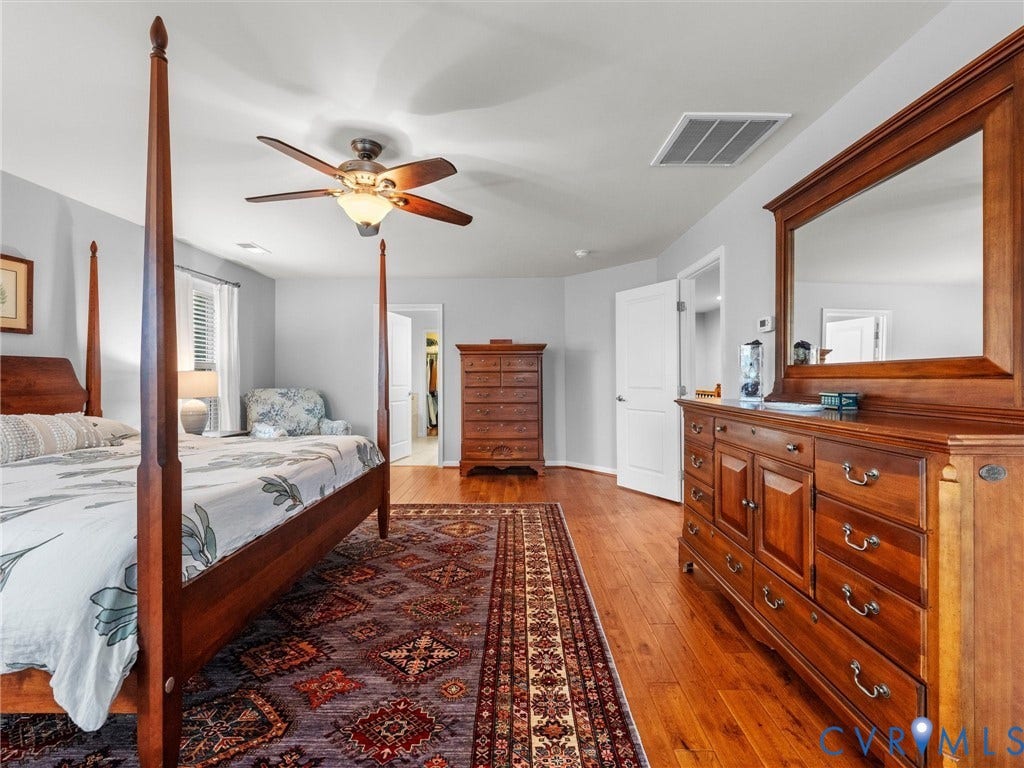 9990 Orchard Meadow Road, Mechanicsville, VA 23116 Hardwood flooring throughout, ceiling fan with integrated lighting, and a white interior door