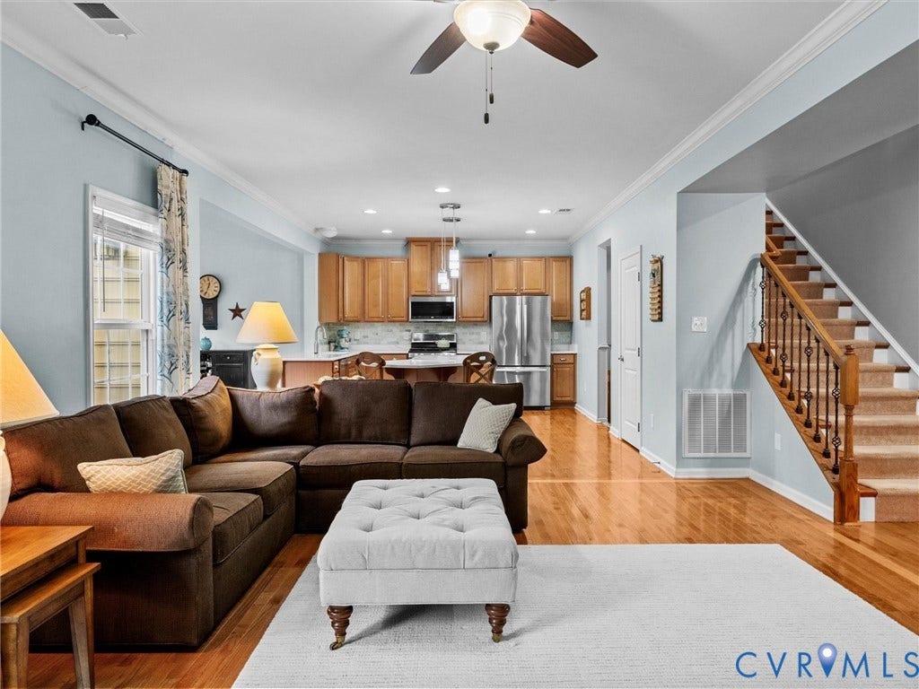 9990 Orchard Meadow Road, Mechanicsville, VA 23116 Hardwood flooring, crown molding, ceiling fan, natural wood cabinetry, and stainless steel appliances