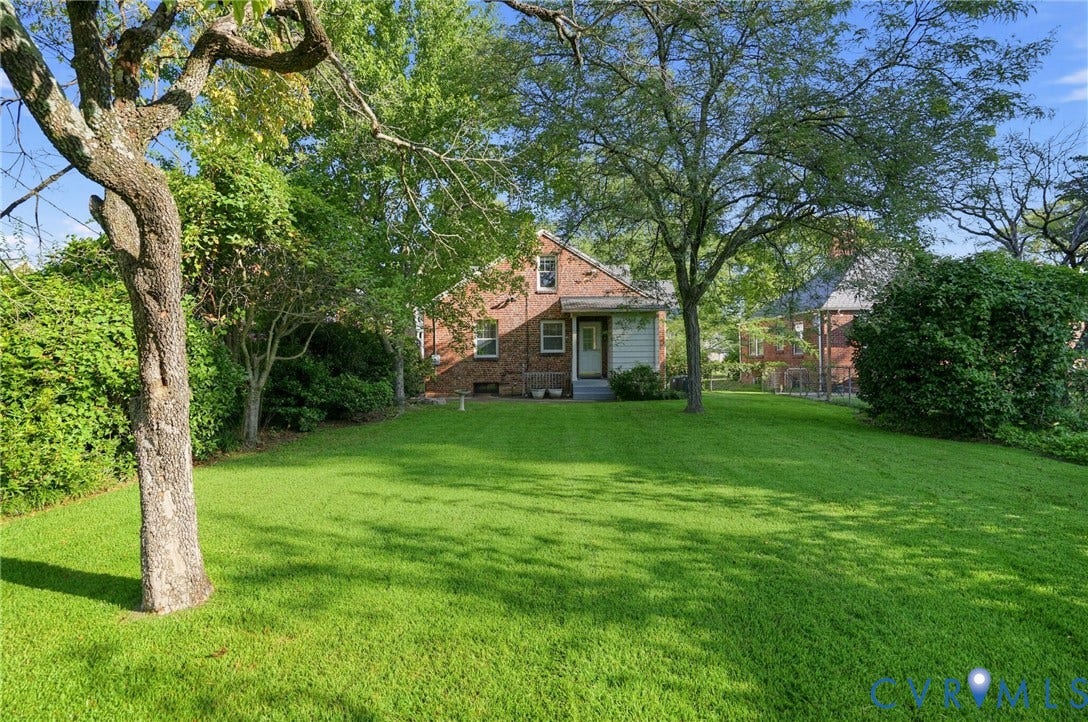 1713 Wilmington Avenue, Richmond, VA 23227 Expansive green lawn with mature trees and established perimeter hedges