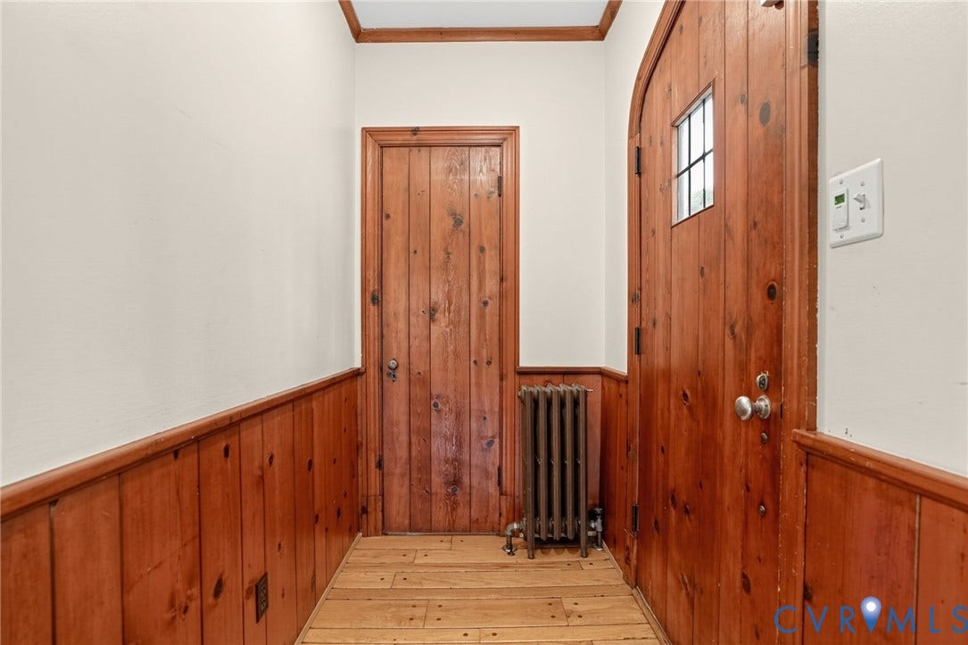 1713 Wilmington Avenue, Richmond, VA 23227 Wood-paneled wainscoting and trim, wood-plank flooring, and solid wood doors