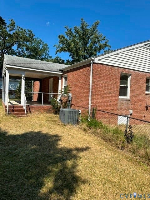 3311 Lanceor Drive, Henrico, VA 23060 Brick exterior with white siding accents and a covered porch