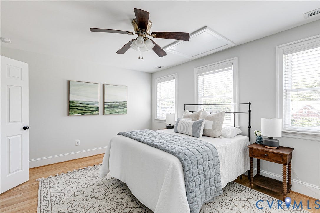1311 N 33rd Street, Oakwood, Richmond, VA 23223 Hardwood flooring, multiple windows with blinds, ceiling fan, solid core door, and an access panel