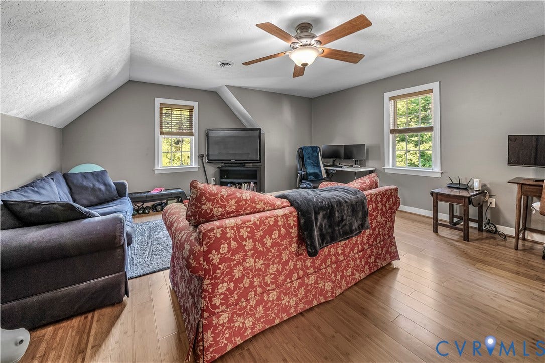 1206 Archie Lane, Osborne Heights / Varina, Henrico, VA 23231 Wood-finish cabinetry, speckled countertops, stainless steel dishwasher, dual basin sink, and recessed lighting