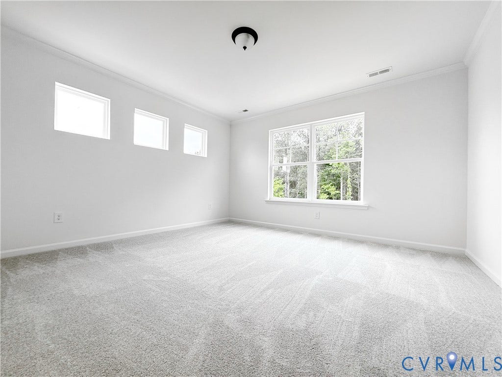 2401 Flora Boulevard, Townes At Arcadia, Henrico, VA 23231 This photo shows a similar floorplan and quality level to Eastwood Homes. Actual design selections and layout may vary.
