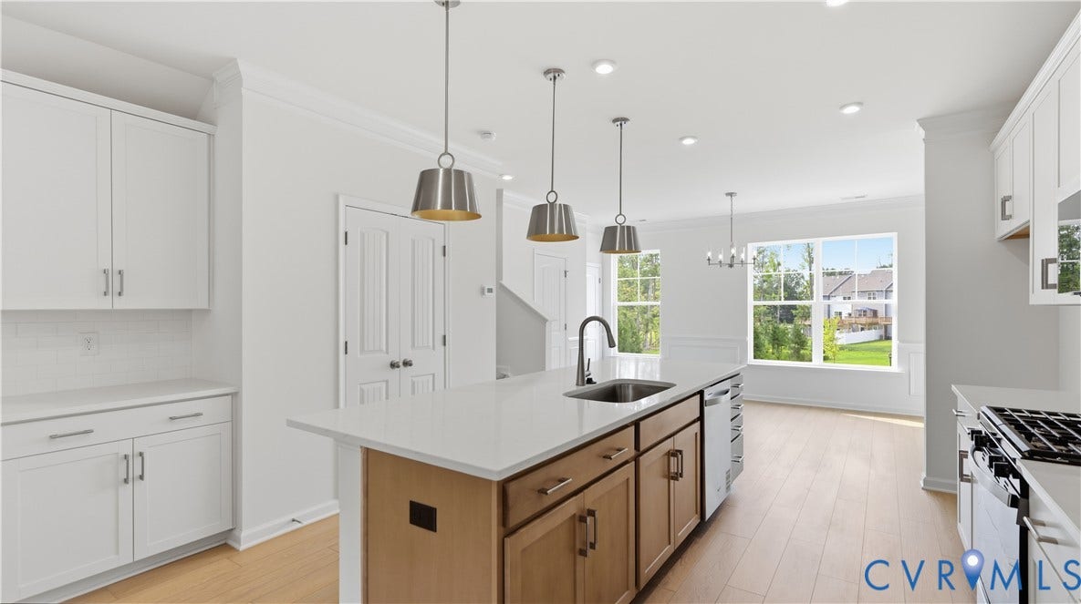 2401 Flora Boulevard, Townes At Arcadia, Henrico, VA 23231 This photo shows a similar floorplan and quality level to Eastwood Homes. Actual design selections and layout may vary.