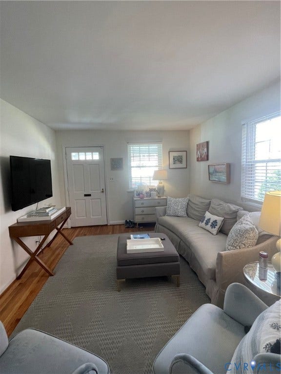4403 Park Avenue, Richmond, VA 23221 Hardwood flooring, painted interior door with upper glass panel, and window with blinds