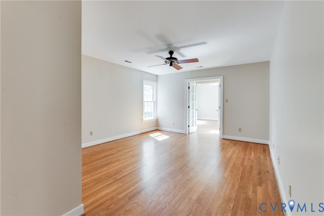 11211 Warren View Road, Henrico, VA 23233 Hardwood flooring, white walls, ceiling fan, single window, and French doors