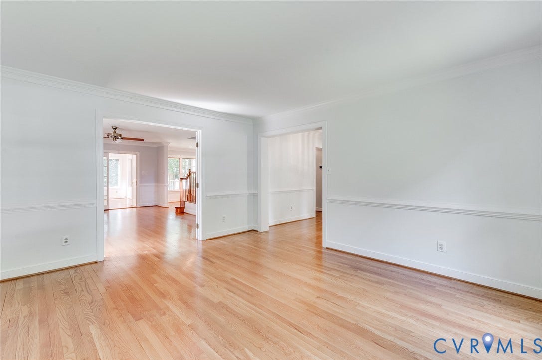 11211 Warren View Road, Henrico, VA 23233 Hardwood flooring, crown molding, chair rail molding, and a ceiling fan