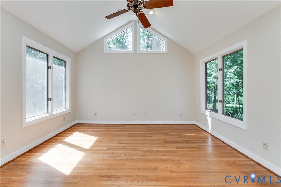 11211 Warren View Road, Henrico, VA 23233 Vaulted ceiling, wood-finish flooring, ceiling fan, and multiple windows