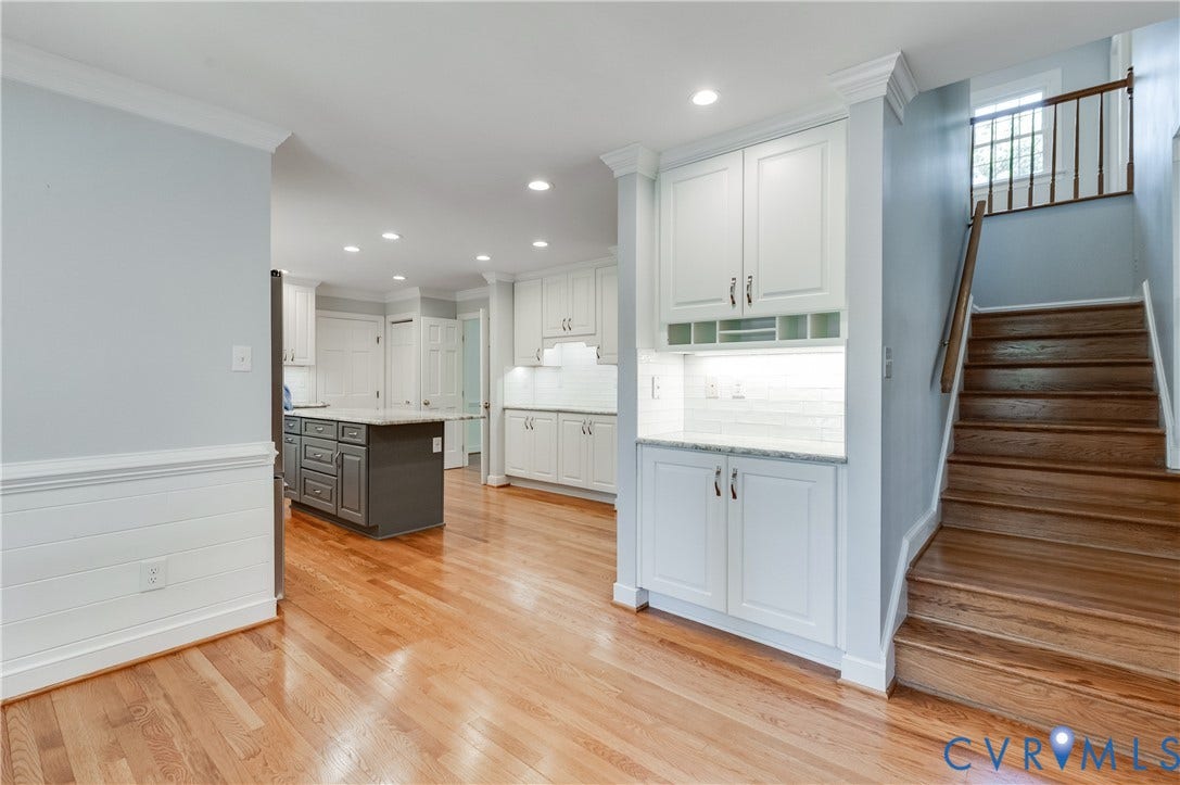 11211 Warren View Road, Henrico, VA 23233 Hardwood flooring, built-in cabinetry, staircase with wood treads and railing, and recessed lighting