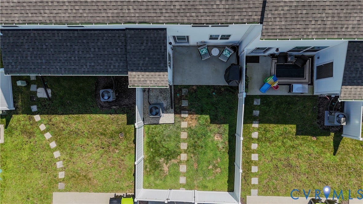 Private patio with concrete flooring