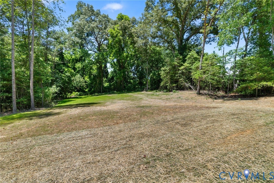 12506 Ashton Dell Road, Chester, VA 23831 Expansive lot with cleared land and mature trees