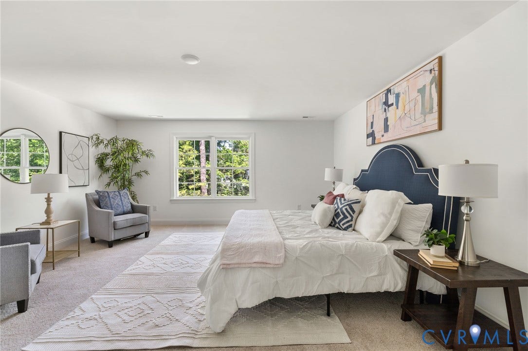 12506 Ashton Dell Road, Chester, VA 23831 Carpeted flooring, white walls, and a large window with natural light