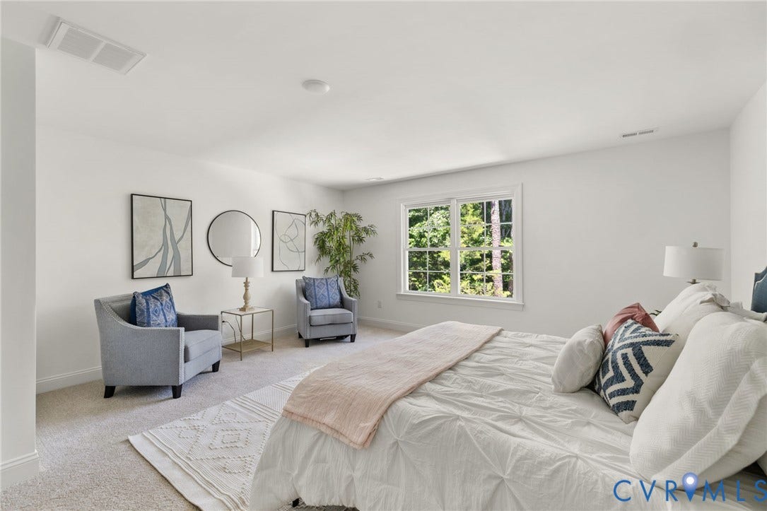 12506 Ashton Dell Road, Chester, VA 23831 Recessed lighting, large window with natural light, wall-to-wall carpeting, and bright white wall finishes