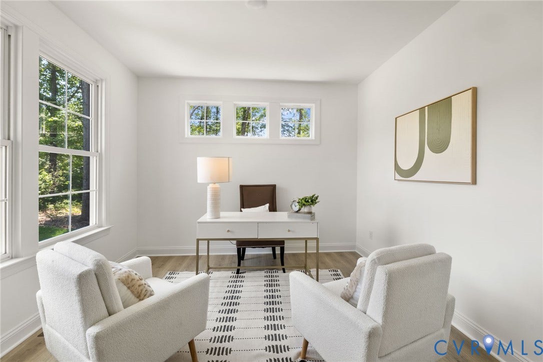 12506 Ashton Dell Road, Chester, VA 23831 Bright interior space with multiple windows, light wood-finish flooring, and white walls