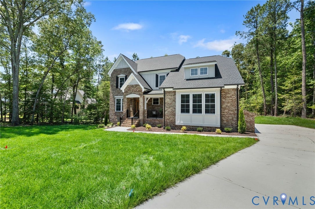 12506 Ashton Dell Road, Chester, VA 23831 Brick and siding exterior with dark-framed windows