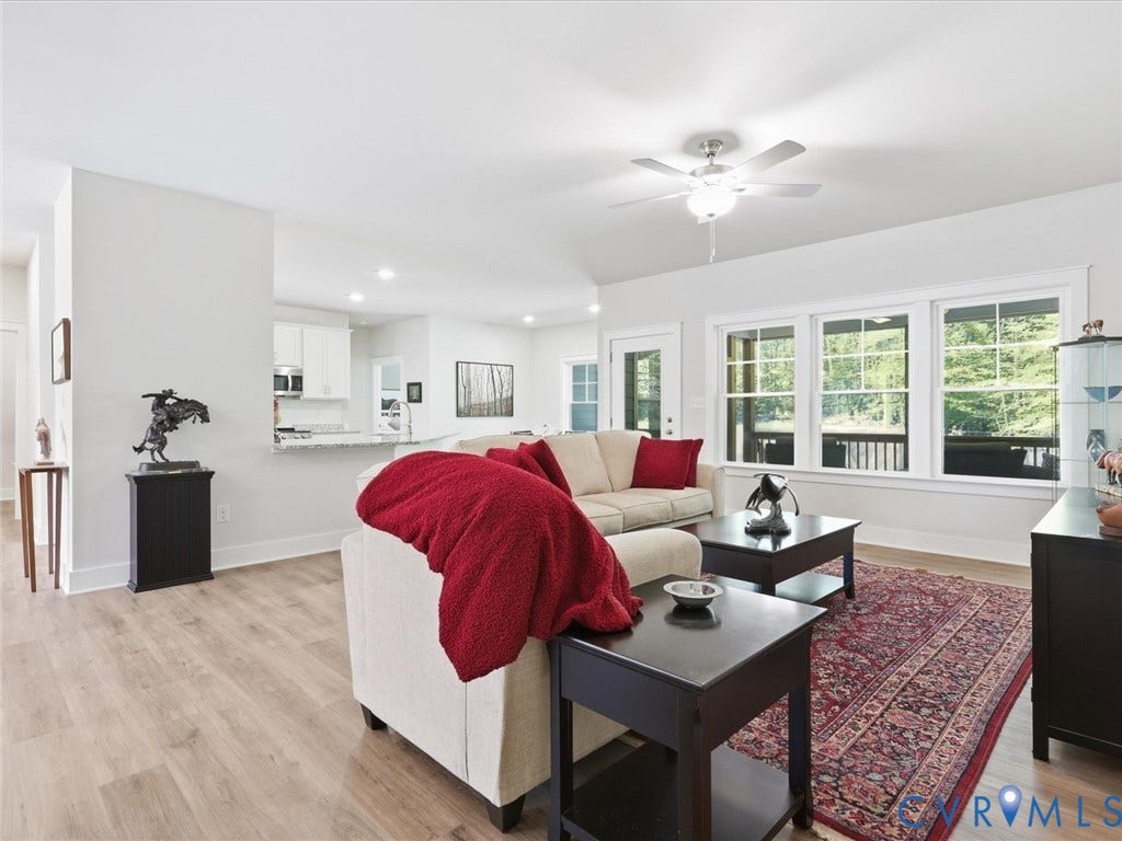 3102 Kensington Lane, Goochland, VA 23063 Open-concept living space featuring wood-finish flooring, recessed lighting, and a ceiling fan