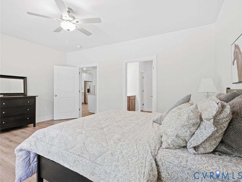 3102 Kensington Lane, Goochland, VA 23063 Recessed lighting, ceiling fan with integrated light, wood-finish flooring, white solid core doors, and white wall finishes