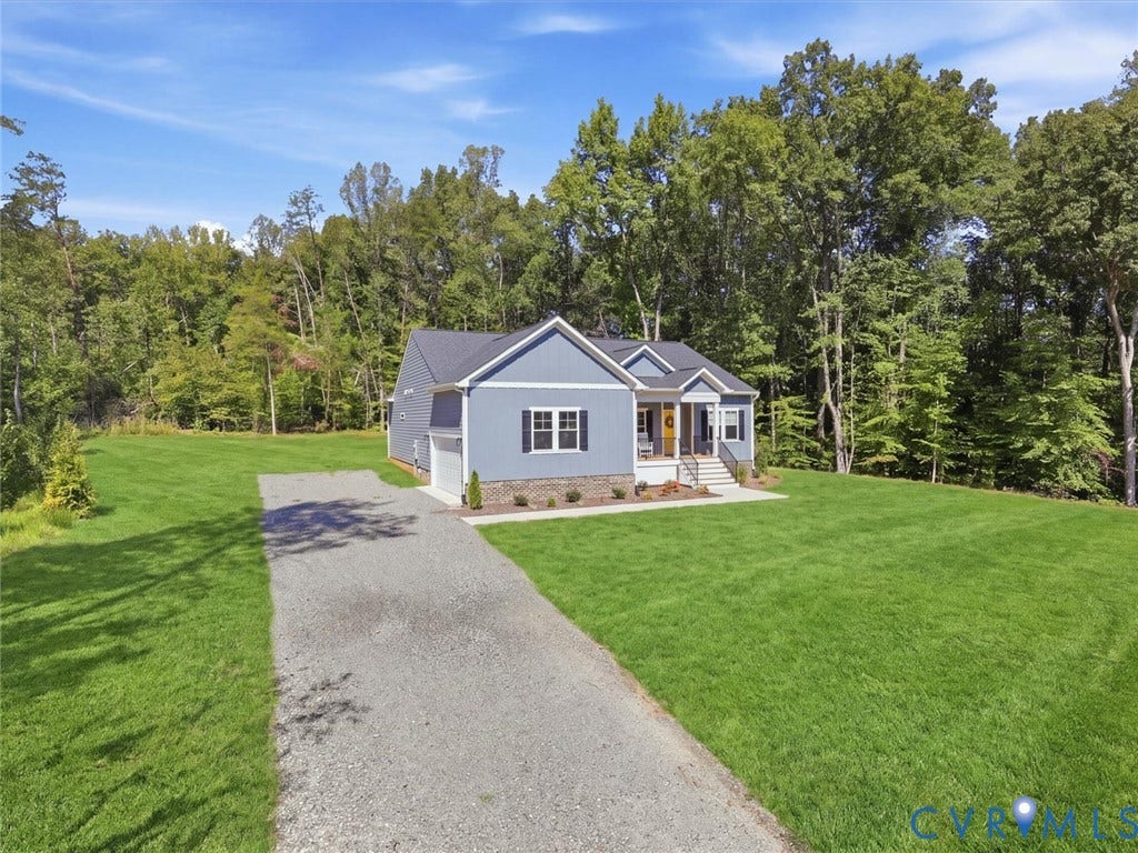 3102 Kensington Lane, Goochland, VA 23063 Single-story residence featuring blue siding, white trim, and a covered front porch