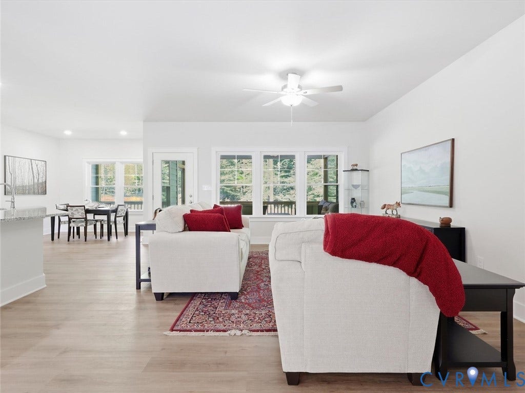3102 Kensington Lane, Goochland, VA 23063 Open-concept living space featuring wood-finish flooring, recessed lighting, and a ceiling fan