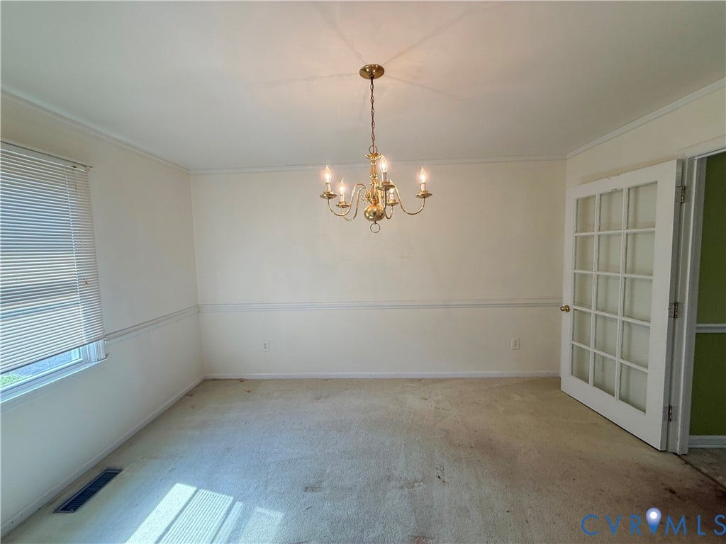 4512 Greenbriar Drive, Chester, VA 23831 Recessed lighting with a brass chandelier, wall trim accents, and French doors